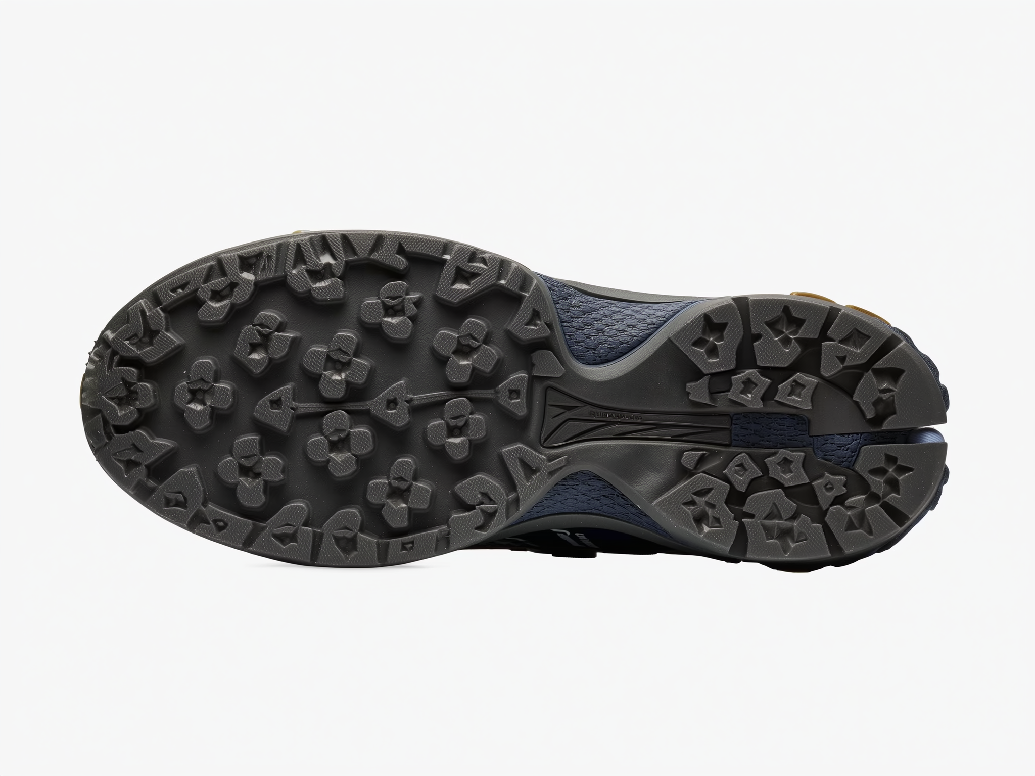 Bottom view of hiking boot sole with dark tread pattern and blue fabric upper