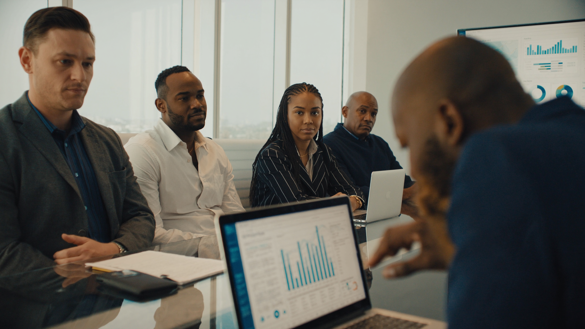 Modern marketing agency team collaborating in a bright, professional office environment
